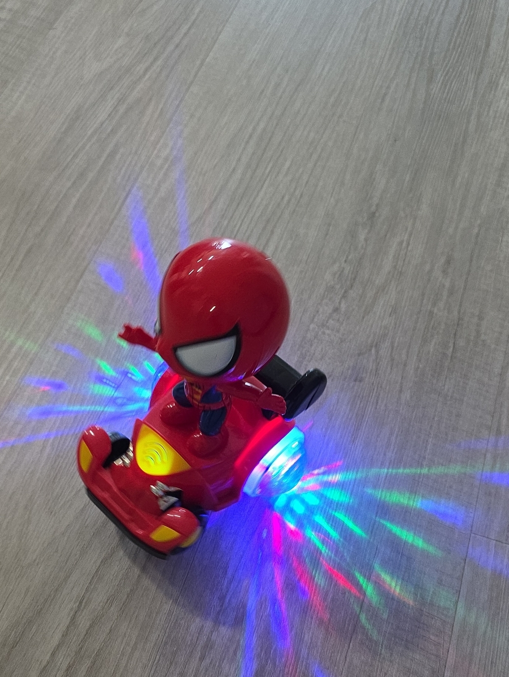 Red Spinning Light-Up Superhero Car Toy